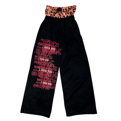 Pantalon jogging large à motifs avec short intégré léopard