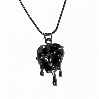Chaîne pendentif cœur noir slime enchainé